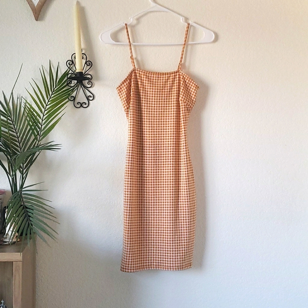 Ragstock mini mustard gingham cami dress.